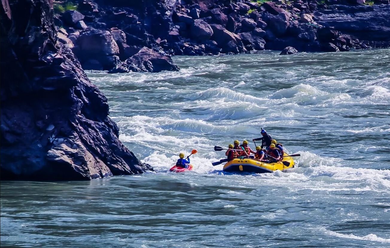 26 Km rafting in Rishikesh from Marine Drive through continuous Grade II–III rapids