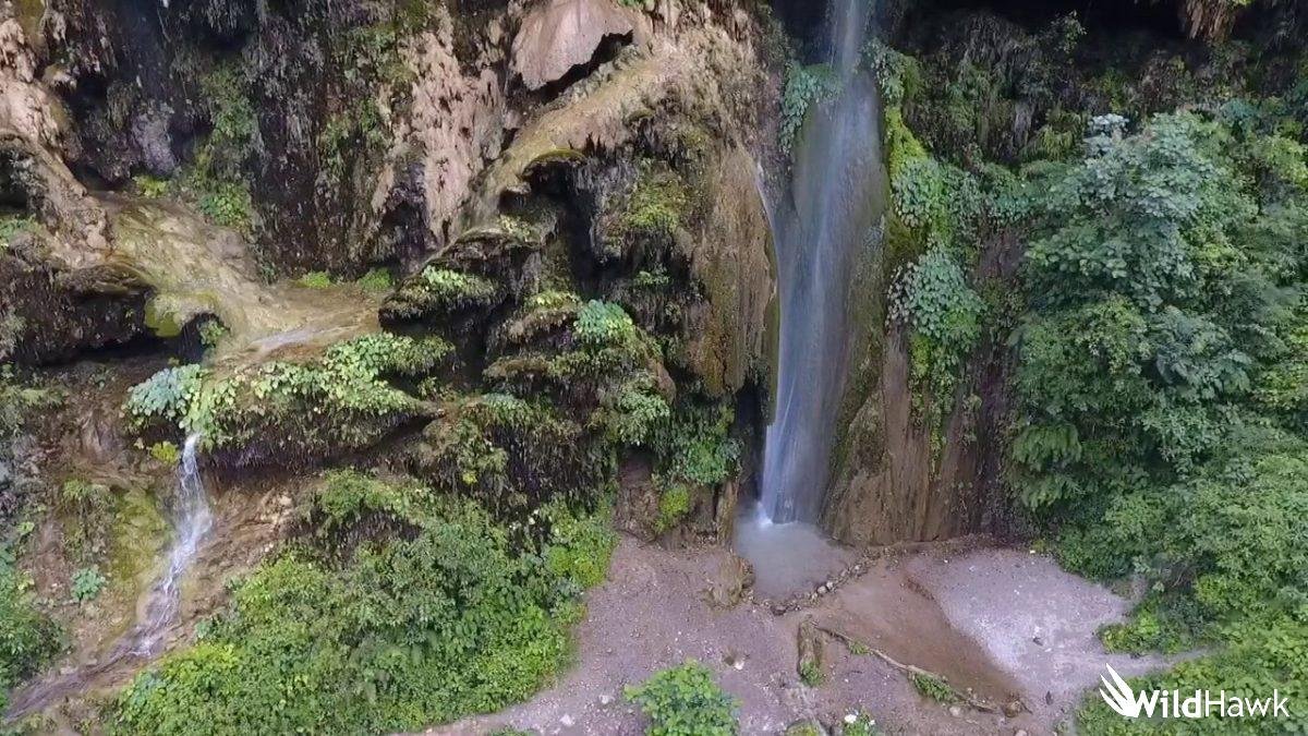 Phool Chatti Waterfall in Rishikesh with gentle cascades, forest trail and serene natural surroundings