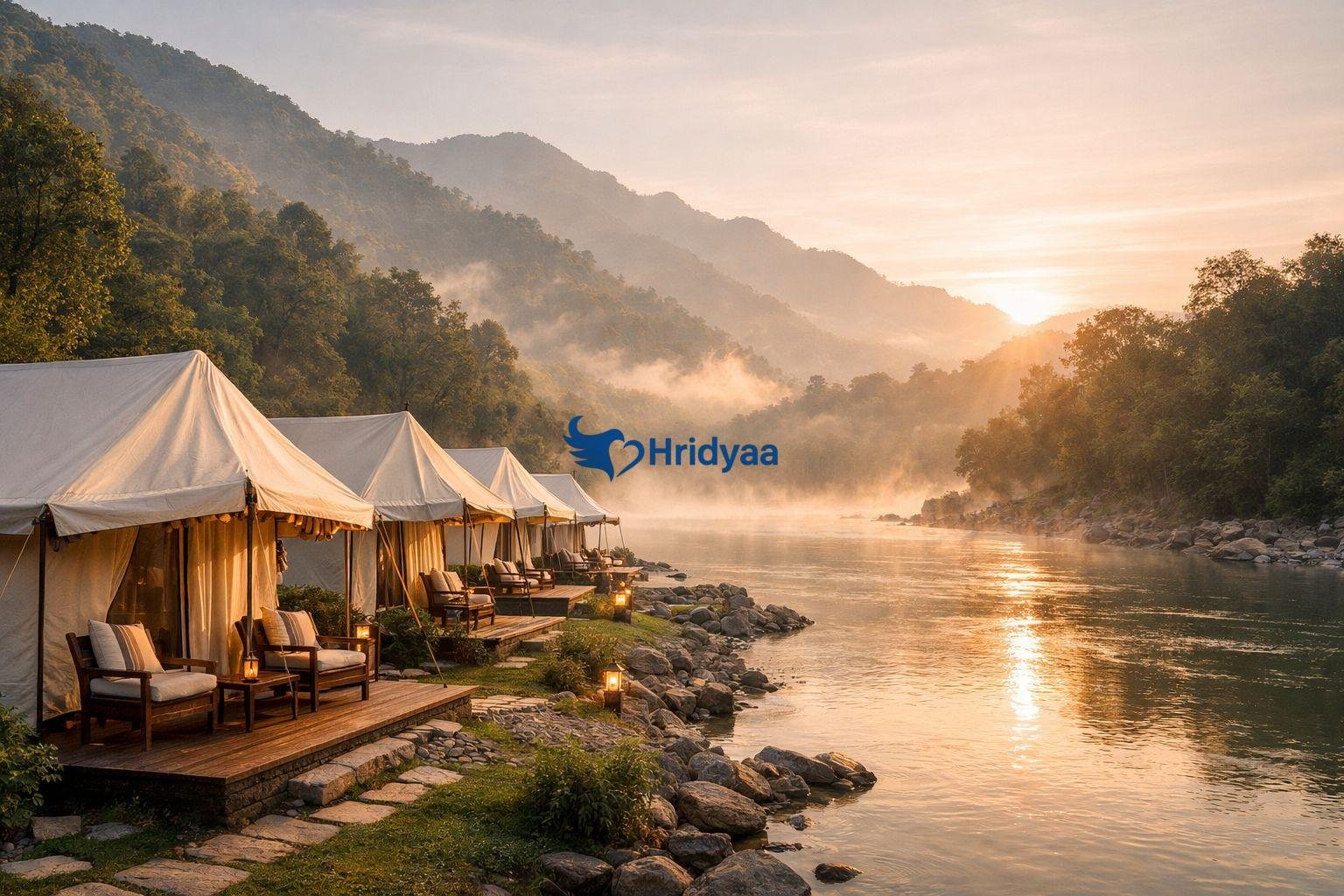 Luxury riverside camping in Rishikesh with Swiss tents facing the Ganga in early morning light