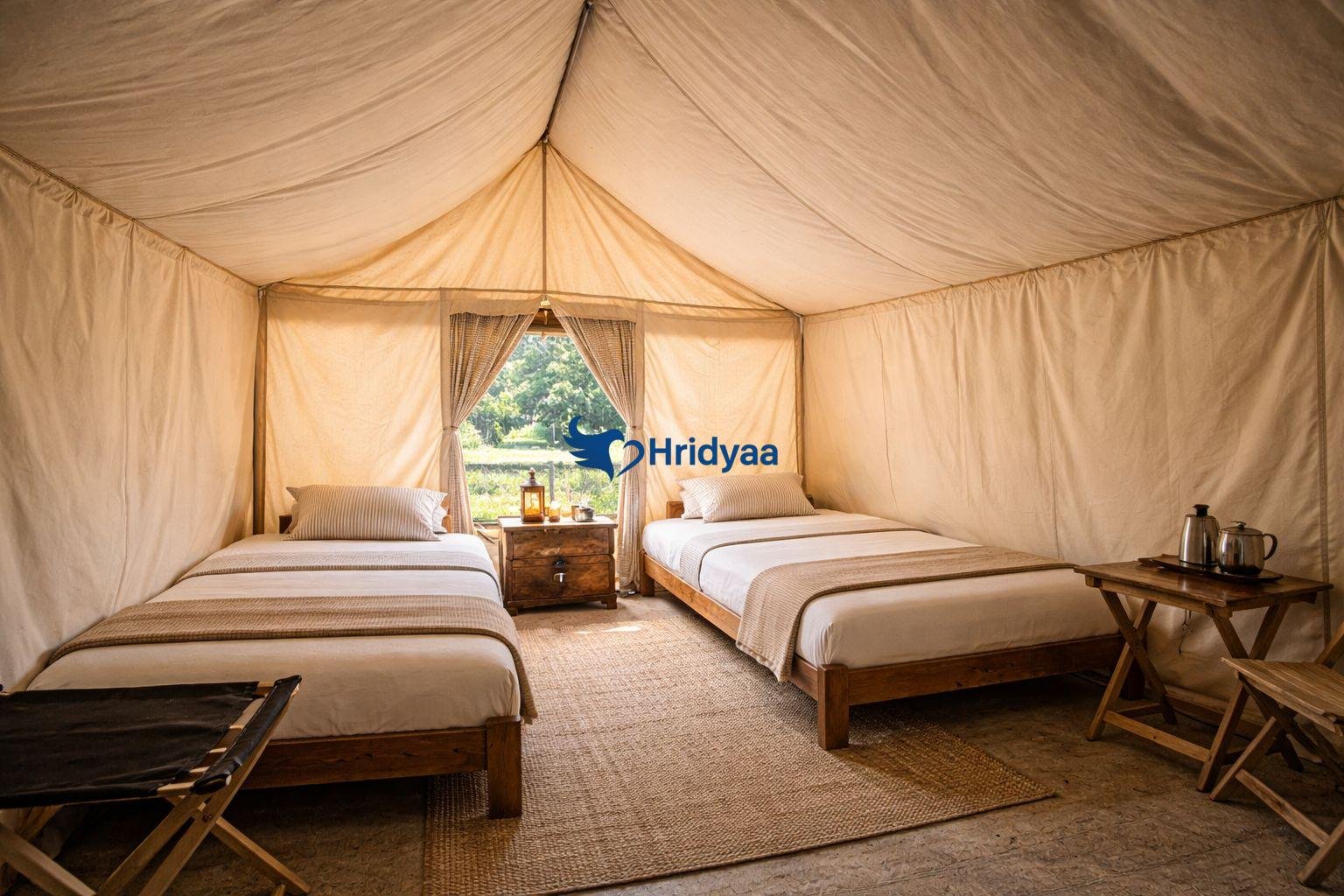Luxury Swiss tent interior at riverside camp in Rishikesh