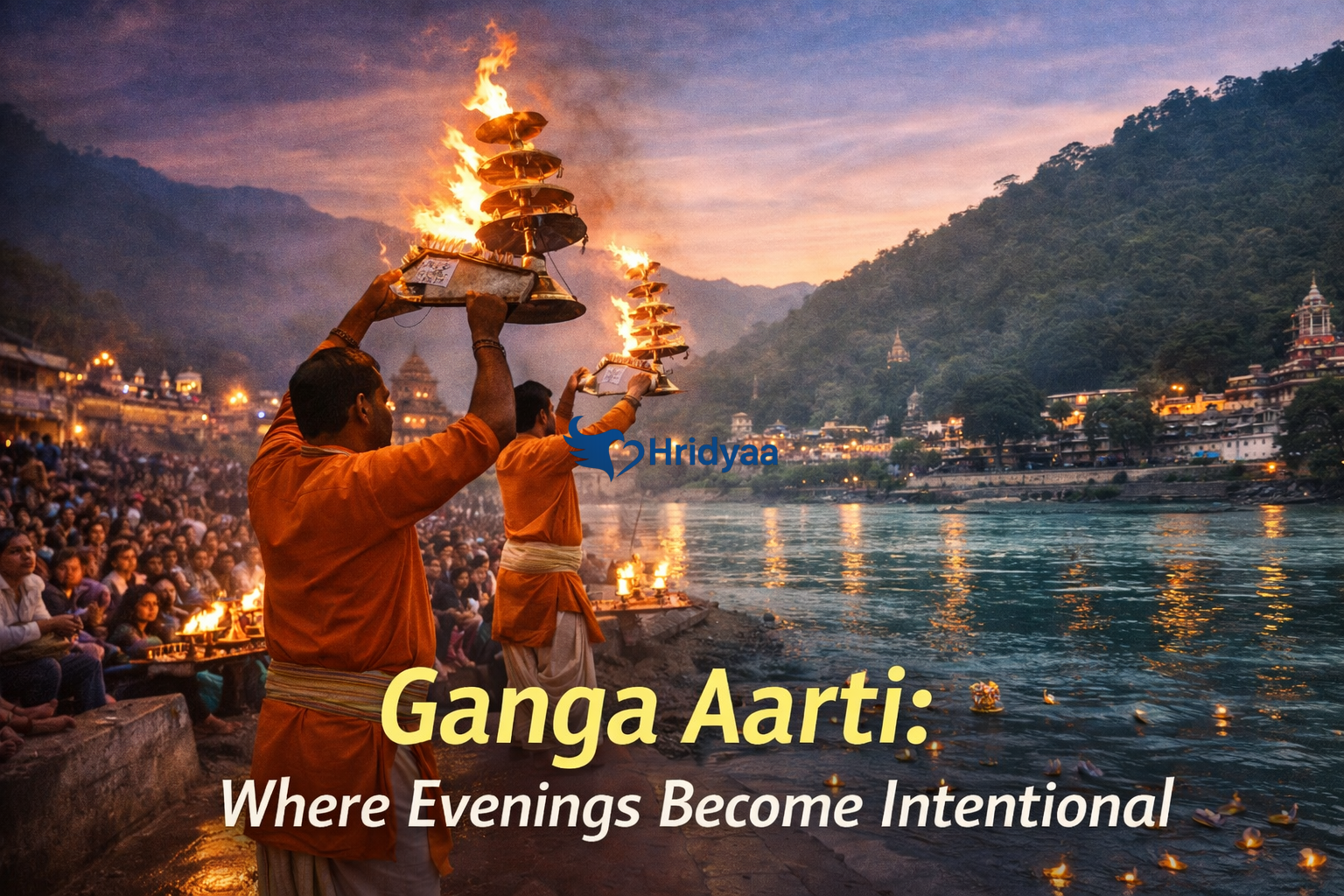 Ganga Aarti at Triveni Ghat in Rishikesh during evening prayers with lamps on the river Ganga