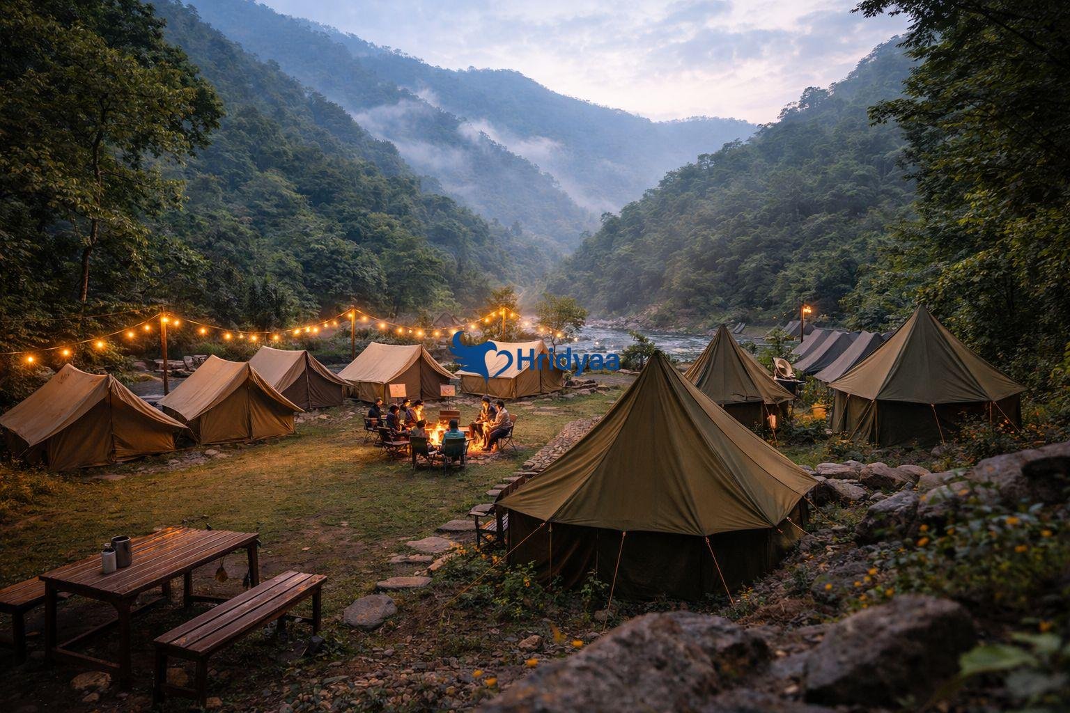 Riverside camping tents along Neelkanth Road near Rishikesh surrounded by forested hills