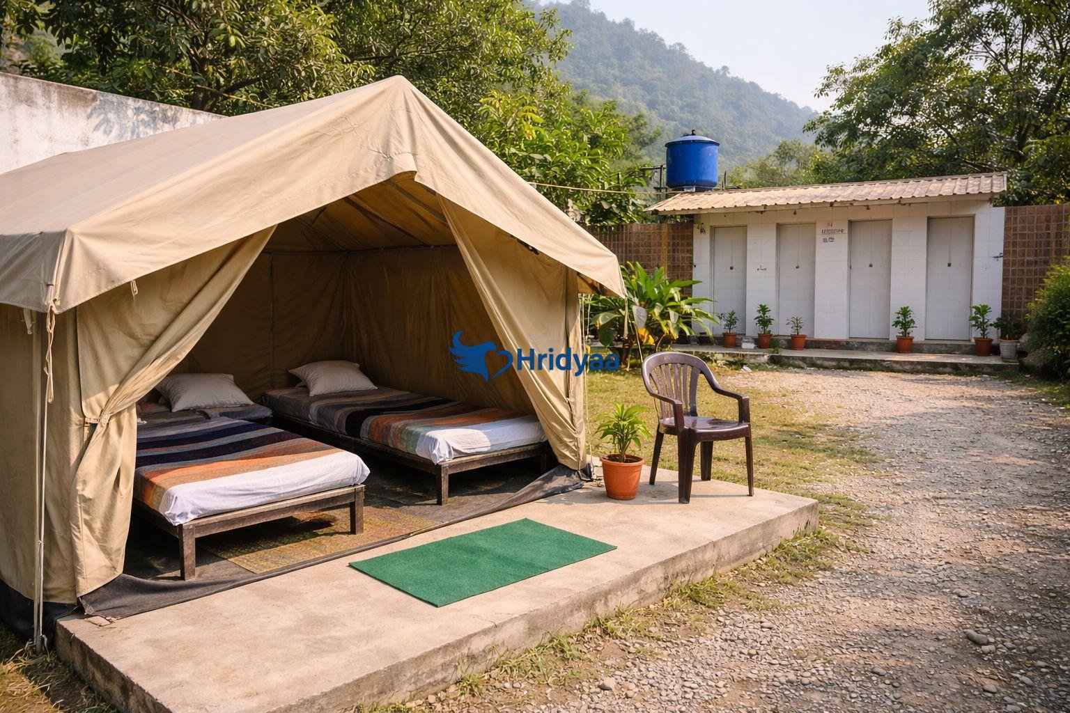 Non-AC budget tent option in Tapovan with shared washroom access