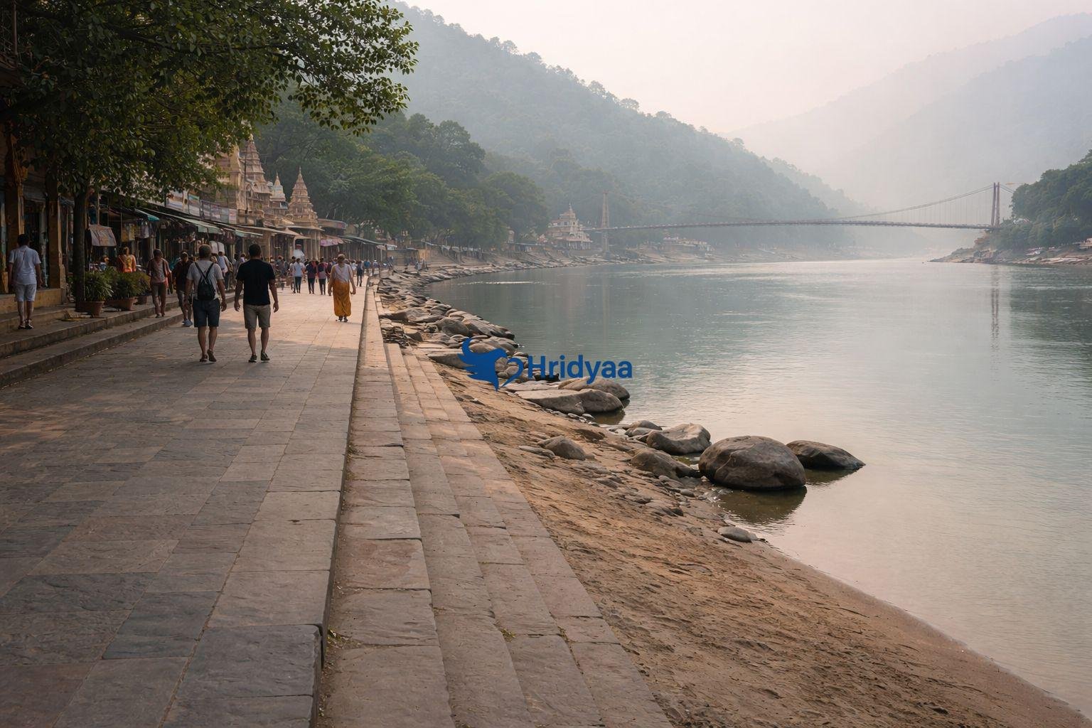 Riverbank scene in Rishikesh showing contrast between busy and quiet areas