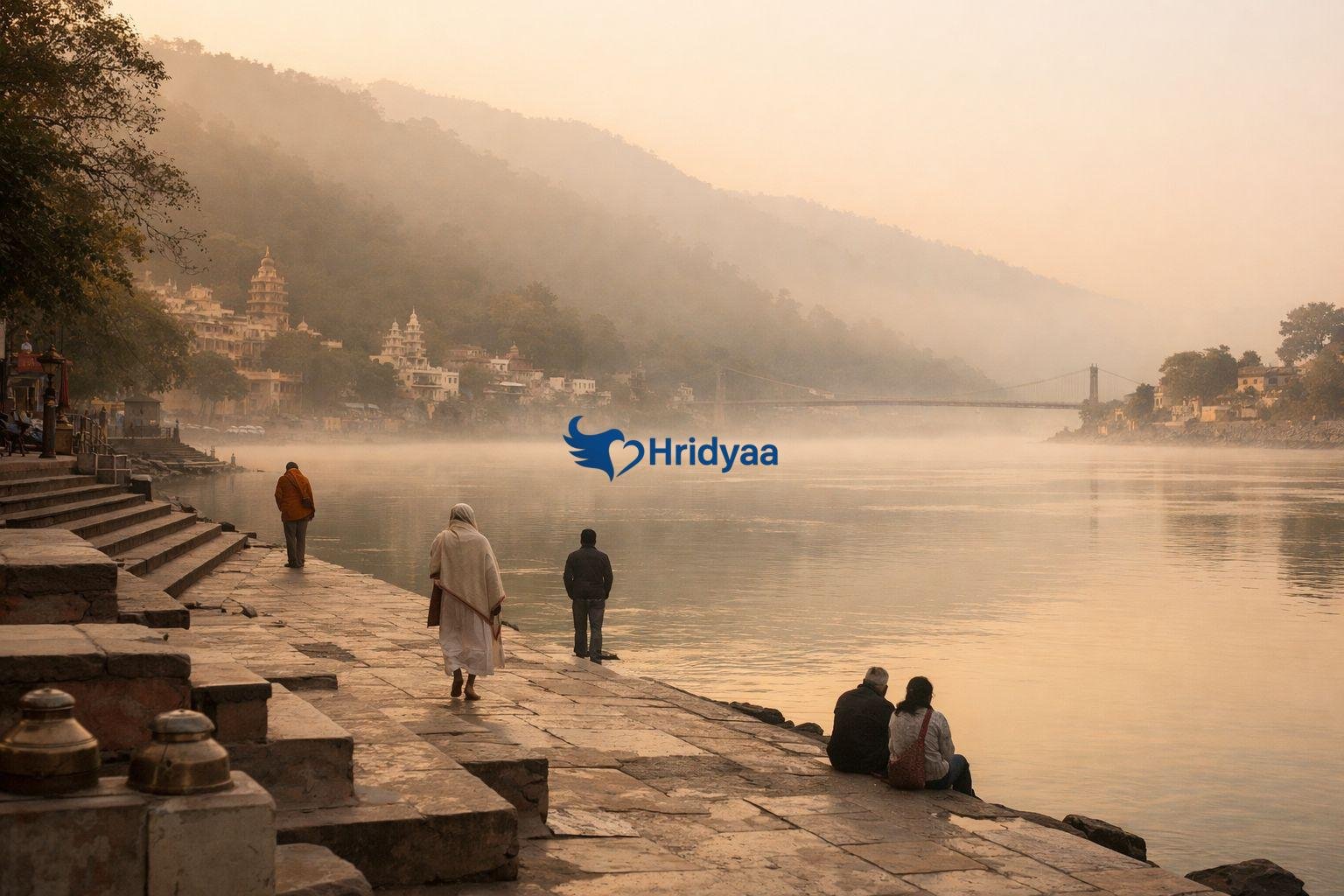 Morning view of the Ganga in Rishikesh with calm surroundings and light foot traffic