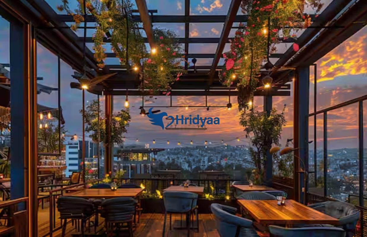 sunset view from rooftop cafe in rishikesh overlooking ganga river